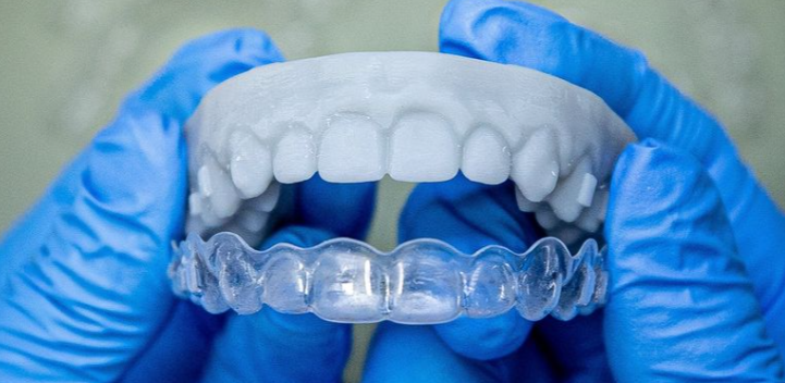 Clear aligner with dental model